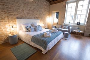 Appartements La Tonnellerie : photos des chambres