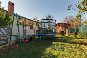 Holiday house Marasi with a montage swimming pool