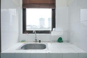 Comfortable and Homey Studio Apartment at Kebagusan City By Travelio