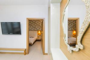 Waniliowy Neptun Park by OneApartments