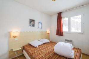 Appartements Residence Les Chalets de Puy Saint Vincent - maeva Home : photos des chambres