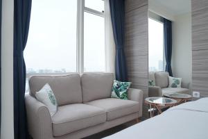 Cozy and Tranquil Studio Menteng Park Apartment By Travelio