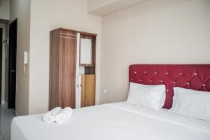 Cozy Minimalist Studio at Casa de Parco Apartment By Travelio