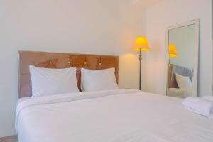 Best Price Studio Apartment at Gunung Putri Square By Travelio