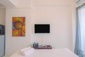 Best Price Studio Apartment at Gunung Putri Square By Travelio