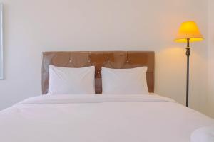 Best Price Studio Apartment at Gunung Putri Square By Travelio