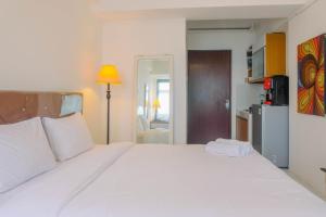 Best Price Studio Apartment at Gunung Putri Square By Travelio