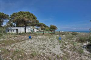 Villas Villa d'architecte pieds dans l'eau 800m parc Galea : photos des chambres