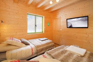 Chalets L'Orchidee : photos des chambres