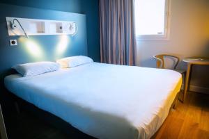 Hotels ibis budget Reims Parc Des Expositions : photos des chambres