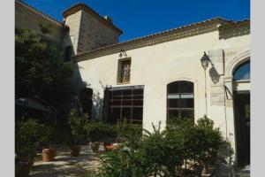 Maisons de vacances Ancienne Abbaye de Franquevaux Anciennes Ecuries : photos des chambres