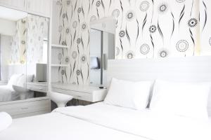 Relaxing 1BR Apartment at Parahyangan Residence near Cihampelas By Travelio