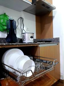 Cozy condo unit 5mins from Mactan Cebu Intl Airport with Netflix