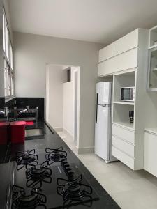 APTO GUARUJA ENSEADA 4 QUARTOS COM WiFi