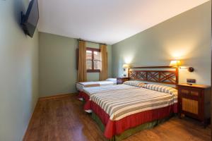 Triple Room room in Palacio de Pujadas by MIJ