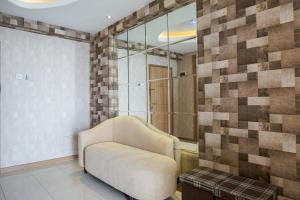 Comfortable 3BR Apartment at Green Palm Residences By Travelio