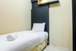 Pleasant 2BR Apartment at Green Pramuka City near Mall By Travelio