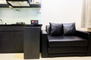 Pleasant 2BR Apartment at Green Pramuka City near Mall By Travelio