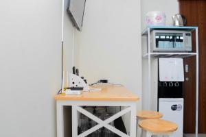 Comfy and Warm Studio Grand Kamala Lagoon Apartment By Travelio