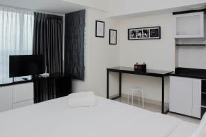 Pleasant and Modern Studio Grand Kamala Lagoon Apartment By Travelio