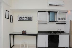 Pleasant and Modern Studio Grand Kamala Lagoon Apartment By Travelio