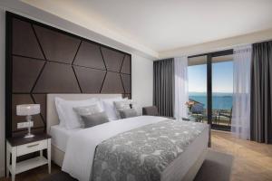 Adria King Bed Room with Sea View room in Ellure Luxury Suites