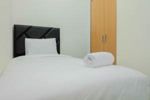 Cozy 2BR Bogorienze Apartment near Nirwana Residence By Travelio