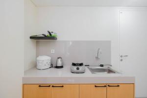 Cozy 2BR Bogorienze Apartment near Nirwana Residence By Travelio