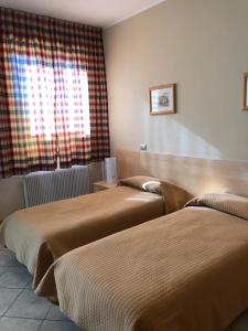 Doppel- oder Zweibettzimmer