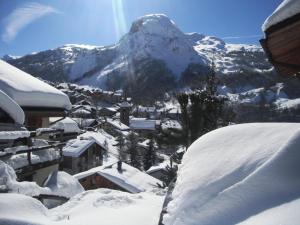 Appartements Chalet Coquelicot confort cosy au coeur du village de Saint Martin : photos des chambres