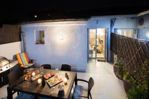 Appartements Les Terrasses Du Midi - Garage+Clim+WiFi : photos des chambres