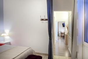 Appartements Les Terrasses Du Midi - Garage+Clim+WiFi : photos des chambres