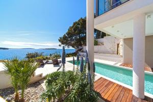 Beach Front Villa with Outdoor Pool room in Golden Rays Luxury Villas & Apartments