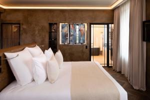 Hotels Hotel Saint-Delis - La Maison du Peintre - Relais & Chateaux : photos des chambres