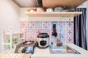 Spacious and Comfortable 2BR Cinere Resort Apartment By Travelio