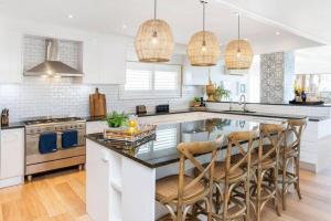 Absolute Beachfront Family Size Home