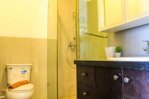 Homey and Warm 3BR Apartment at Ambassade Residences By Travelio