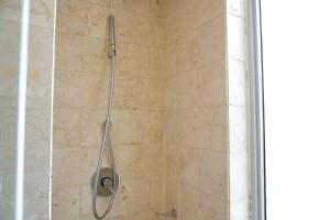 Relaxing 2BR at The Empyreal Condominium Epicentrum Apartment By Travelio