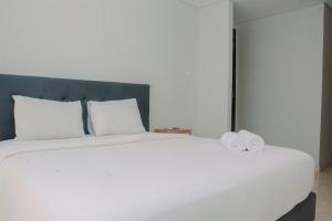 Spacious 2BR with Private Lift at Masterpiece The Epicentrum Kuningan Apartment By Travelio