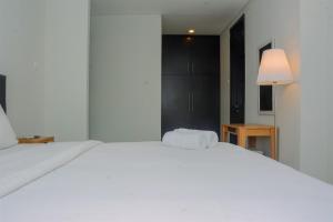 Spacious 2BR with Private Lift at Masterpiece The Epicentrum Kuningan Apartment By Travelio
