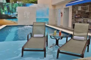 SUITES EM CANTOS Do MUNDO, ENCONTRE PAZ NESSA MICRO REGIÃO ECÓLOGICA, PRÓXIMO AS PRAIAS DO GUAÍUBA E DO TOMBO - غوارويا