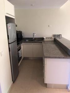 Beautiful One Bedroom unit with pool and Beach club in a Golf Project