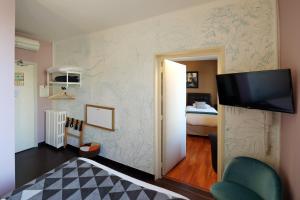 Hotels Hotel Les Pasteliers : photos des chambres