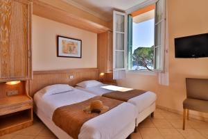 Hotels Hotel De La Darse : photos des chambres