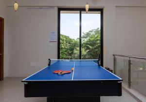 StayVistas Greenwoods Villa 6 - City-Center Villa with Private Pool, Terrace, Lift & Ping-Pong Table