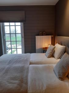 Deluxe Apartment room in Casa-Cosi beautiful guesthouses for 1-4p with own kitchen reserved parking and private terrace in shared garden with seasonal pool and sauna minishop available for meals and breakfast or order breakfast basket