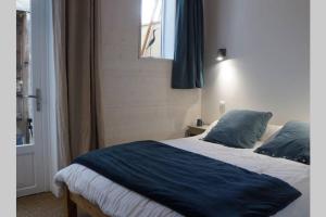 Appartements La SUITE des AUGUSTINS : photos des chambres