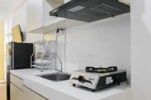 New Furnished Studio Apartment at M-Town Residence By Travelio