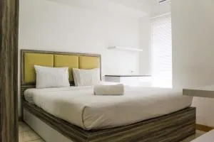 Relaxing 2BR Apartment at M-Town Residence By Travelio - Pumpangsineng