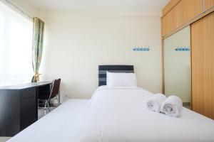 Cozy Minimalist Studio @ Taman Melati Margonda Apartment By Travelio